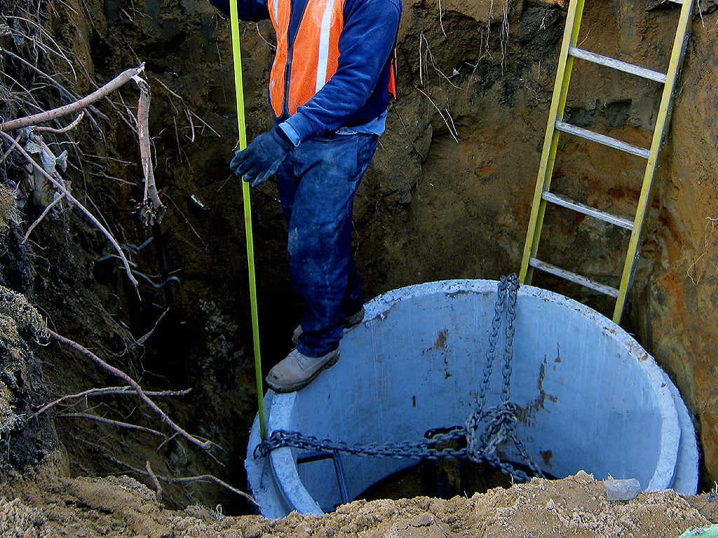 private sewer manhole installation