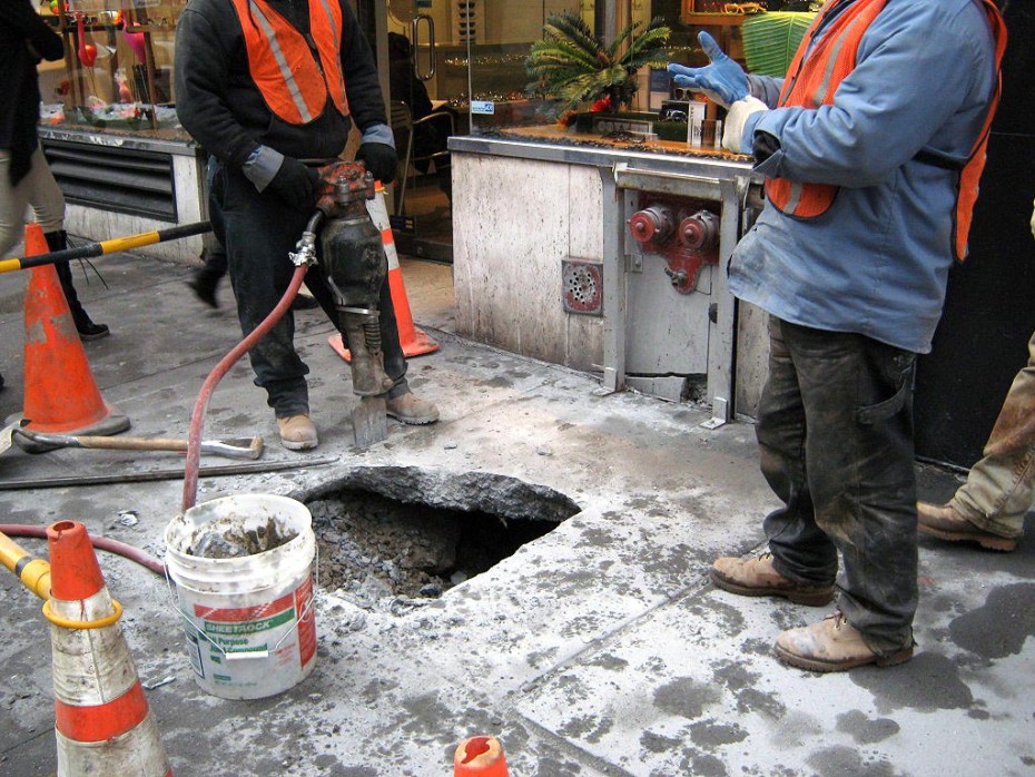 water main break concrete hole ready for blankets