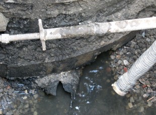 crushed pipe in ground